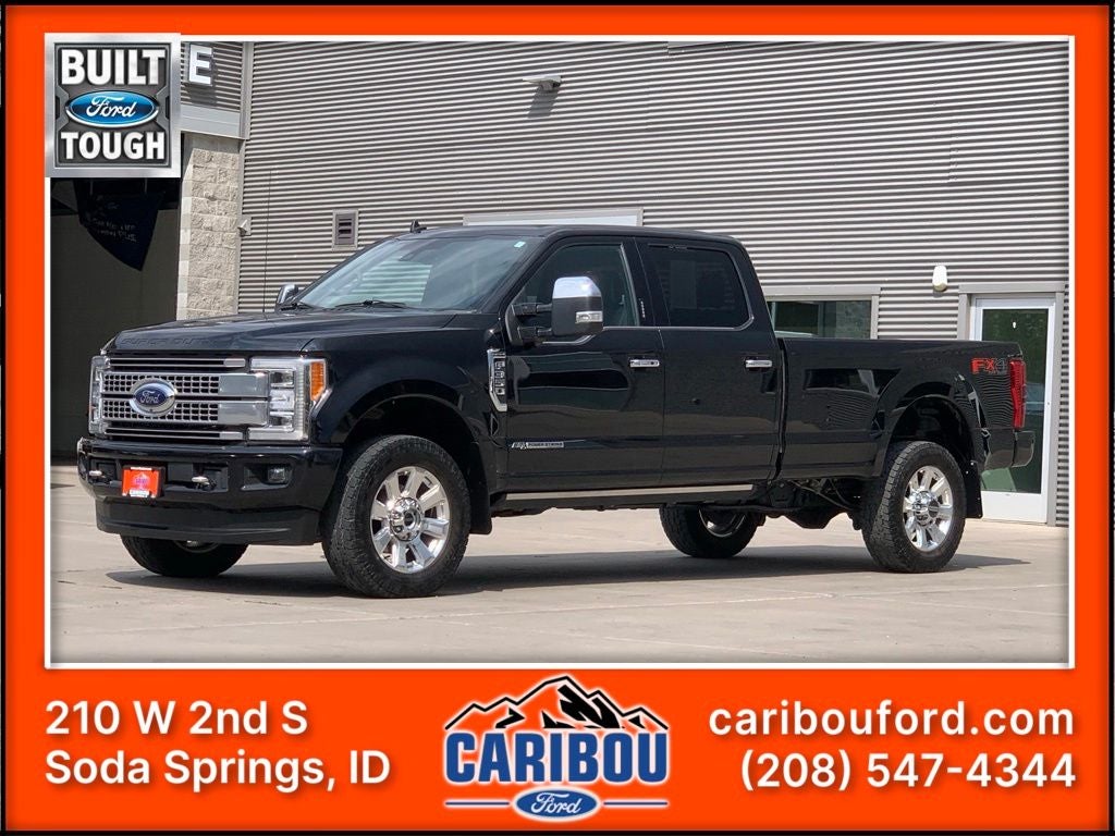 2019 Ford F-350SD Platinum in Black Metallic — front three-quarter view