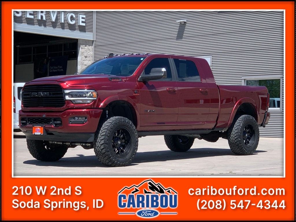 2022 RAM 3500 Laramie in Delmonico Red Pearlcoat — front three-quarter view