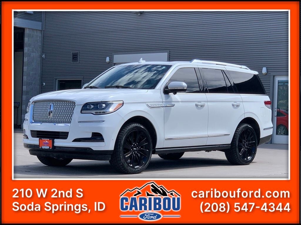 2023 Lincoln Navigator Reserve in White Metallic — front three-quarter view